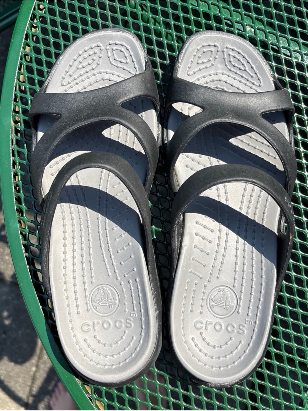 CROCS Women’s Black Strappy Sandals with Silver Footbed